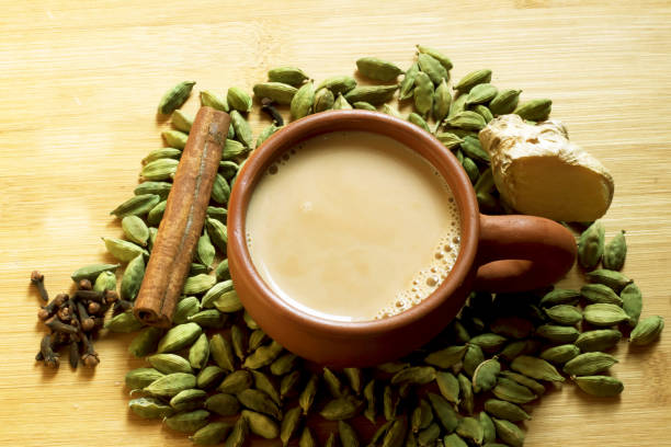 Tea served in a clay cup with background