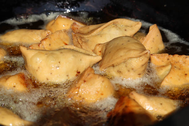 Cooking Indian Popular Famous Snacks Samosa Fry in Oil