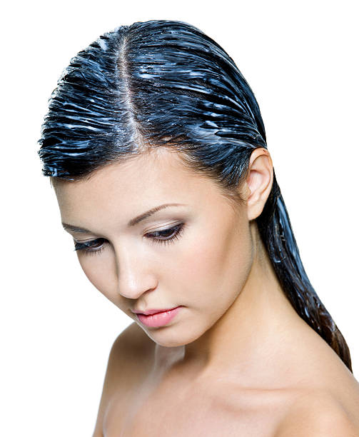 Portrait of woman with paint for hairs on them - isolated on white