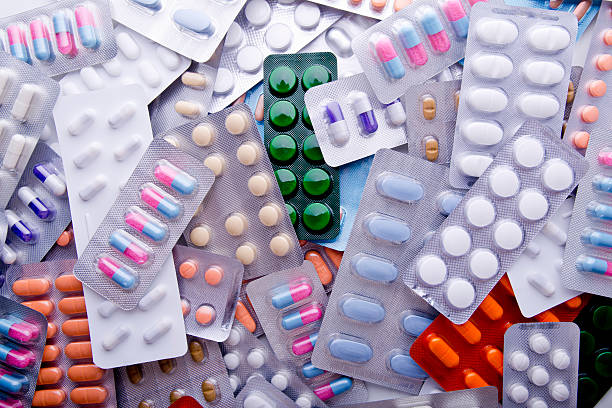 Colorful Assortment Of Medicine Tables & Capsules.